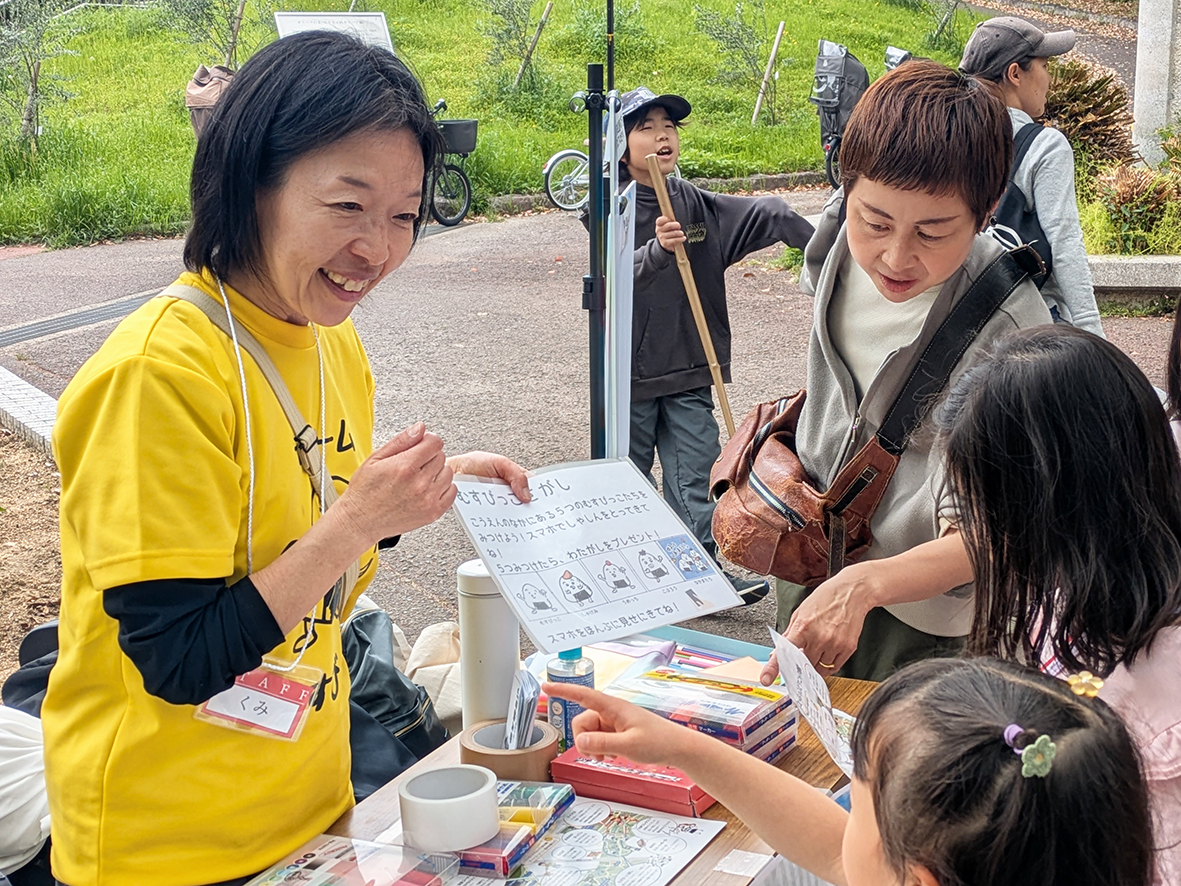 （アイキャッチ兼用画像櫻井さん：公園活性化のイベントで中心的な役割を果たした西光寺坊守の櫻井久美さん（左））